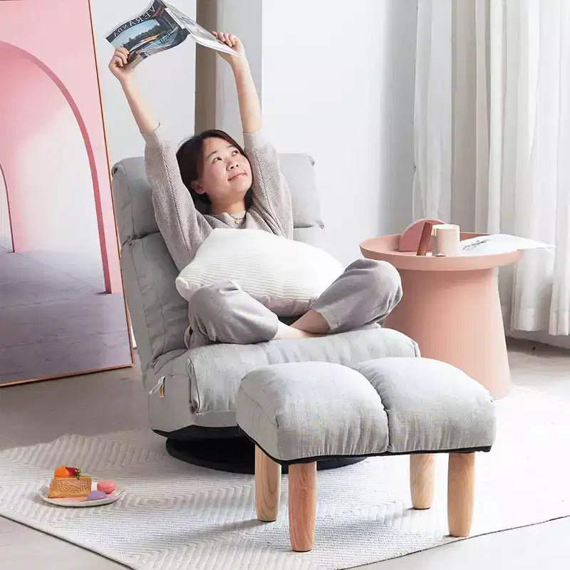 Fauteuil de sol inclinable simple gris avec repose-pieds et base pivotante