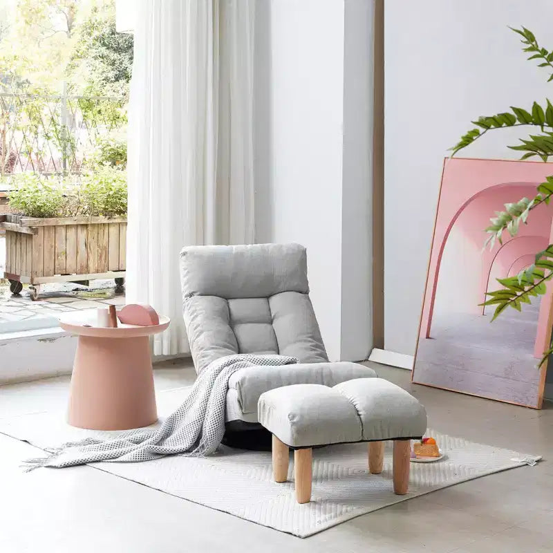 Fauteuil de sol inclinable simple gris avec repose-pieds et base pivotante
